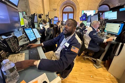 Stock market today: Wall Street loses ground ahead of key reports on the job market
